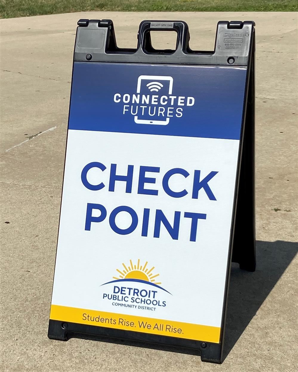 Check point signage outside of Connected Futures pickup location Check point signage outside of Connected Futures pickup location